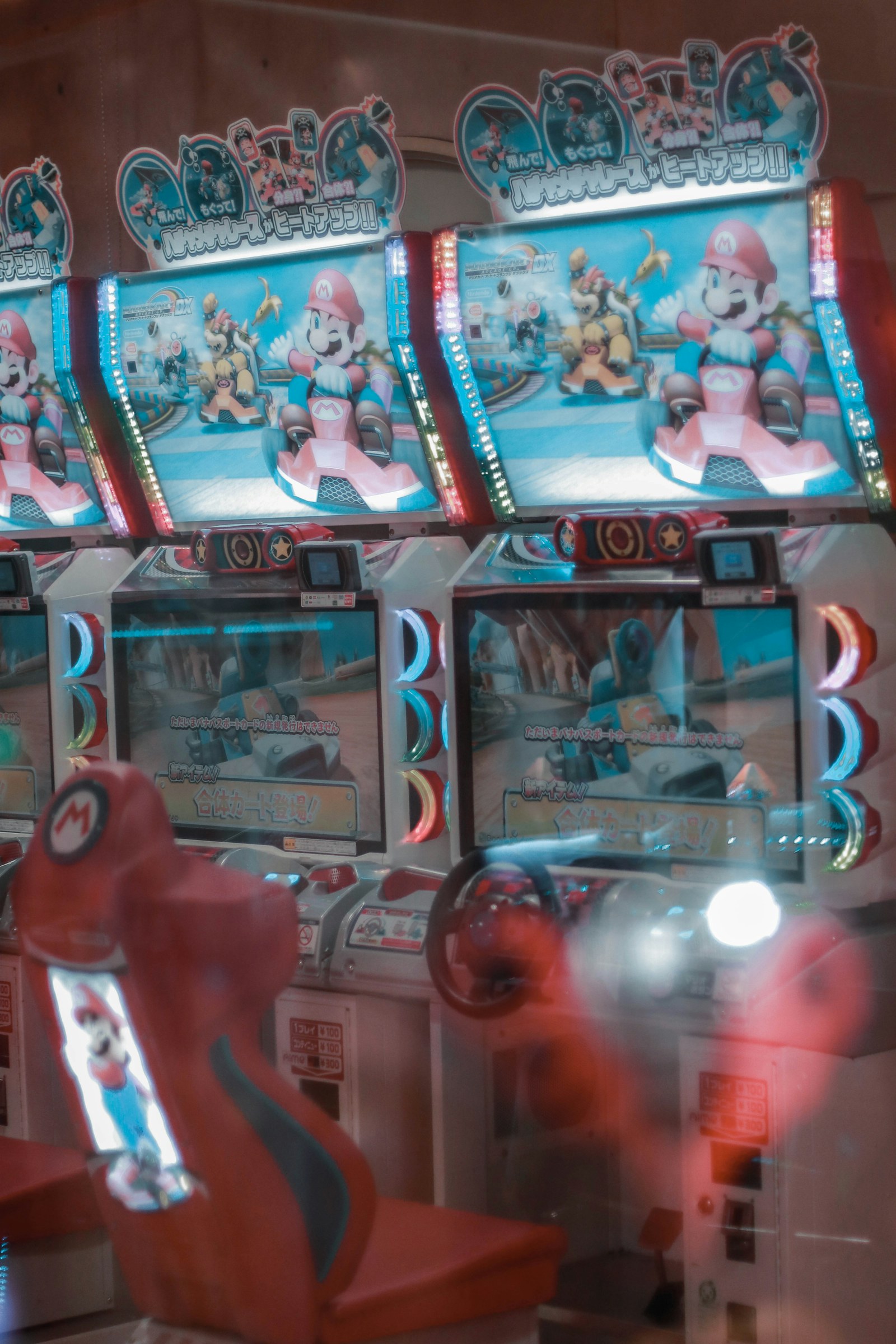 A colourful retro arcade cabinet representing the history and craft of video-game music